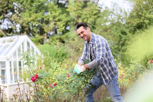 Responsible garden service team following health and safety procedures