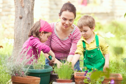 A professional gardener carrying out outdoor maintenance work